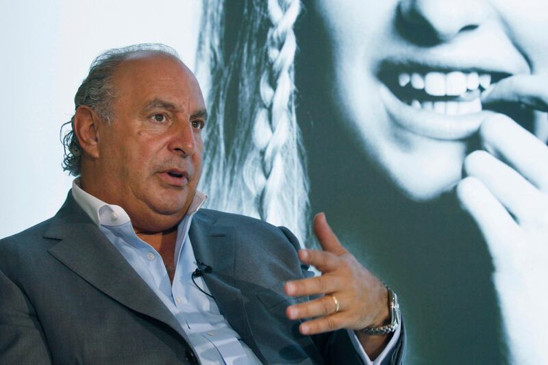 FILE - In this file photo dated Wednesday, June 5, 2013, Philip Green speaks during an interview at his new Topshop store in Hong Kong. A British newspaper has published Saturday Feb. 9, 2019, details of allegations of sexual and racial misconduct by retail tycoon Philip Green, after the Topshop owner dropped a legal bid to stop the claims being reported.(AP Photo/Kin Cheung, FILE)