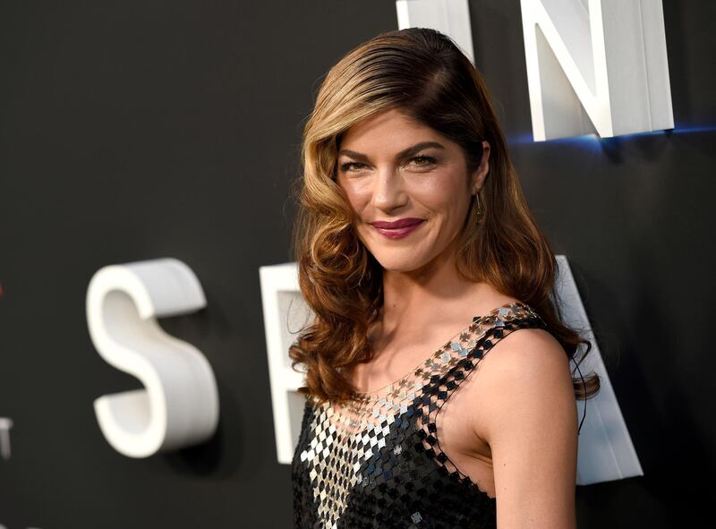 FILE - In this April 9, 2018 file photo, Selma Blair arrives at the Los Angeles premiere of "Lost in Space" at the ArcLight Cinerama Dome. The film and TV actress has announced she is dealing with a diagnosis of multiple sclerosis. In a post Saturday, Oct. 20, 2018 on her Instagram account, Blair, 46, says she was diagnosed with the disease of the central nervous system on Aug. 16. (Photo by Chris Pizzello/Invision/AP, File)