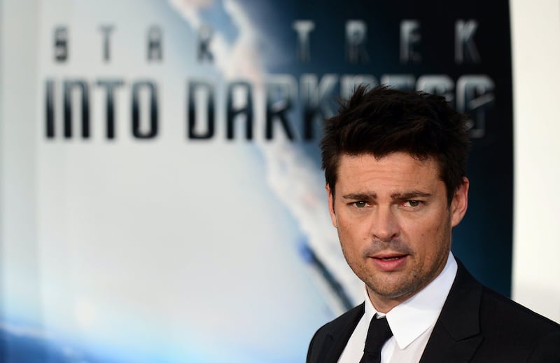 Karl Urban, who plays the role of 'Bones', poses on arrival for the Los Angeles premiere of the movie 'Star Trek Into Darkness" in Hollywood, California on May 14, 2013. The film opens nationwide on May 15. AFP PHOTO/Frederic J. BROWN
 *** Local Caption ***  116697-01-08.jpg