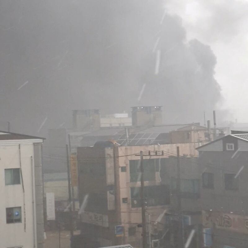 Smoke rises from a steel plant in Pohang soon after the typhoon hit. Reuters