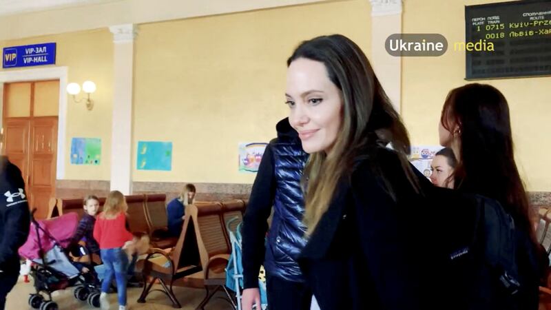 Jolie walks inside the main railway station during her visit to Lviv. Reuters