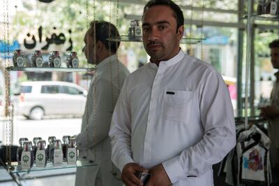 Ali Bahib, manager at Gharzai Saffron stants in his shop in Herat. 