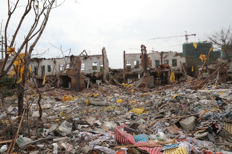 Debris is seen at the site of the blast in Jiangbei district. VCG via Getty Images