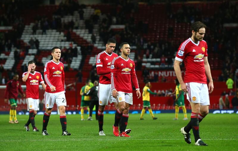 Manchester United players leave the pitch after their team’s 1-2 defeat in the Barclays Premier League match between Manchester United and Norwich City at Old Trafford on December 19, 2015 in Manchester, England. (Photo by Alex Livesey / Getty Images)