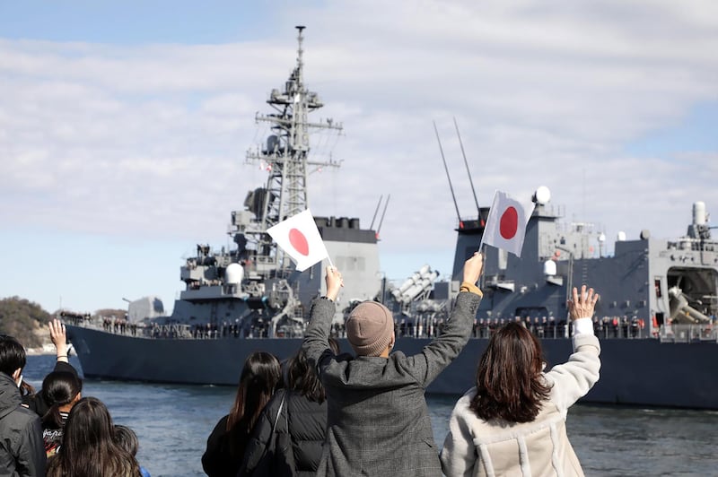 People wave as Japan's Maritime Self-Defence Force destroyer "Takanami" leaves for the Middle East at Yokosuka Naval Base in Yokosuka, Kanagawa prefecture on February 2, 2020. Japan dispatched the naval destroyer to Middle East for a rare overseas mission to ensure safety of Japanese ships amid lingering tension between Iran and the US. - Japan OUT
 / AFP / JIJI PRESS / STR
