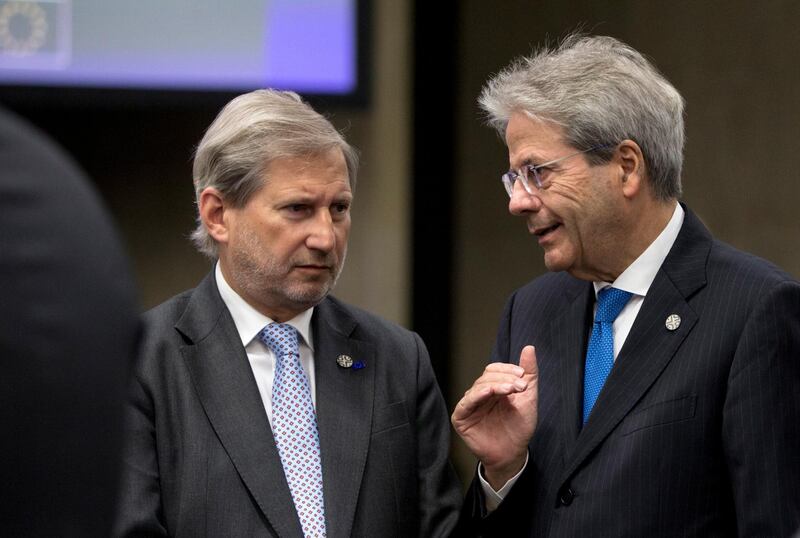 Johannes Hahn, European Commissioner for European Neighbourhood Policy and Enlargement Negotiations (left) speaks with Italian Prime Minister Paolo Gentiloni during a round table discussion at an informal European Union (EU) summit with Western Balkans countries at the National Palace of Culture in Sofia, Bulgaria. Virginia Mayo / EPA