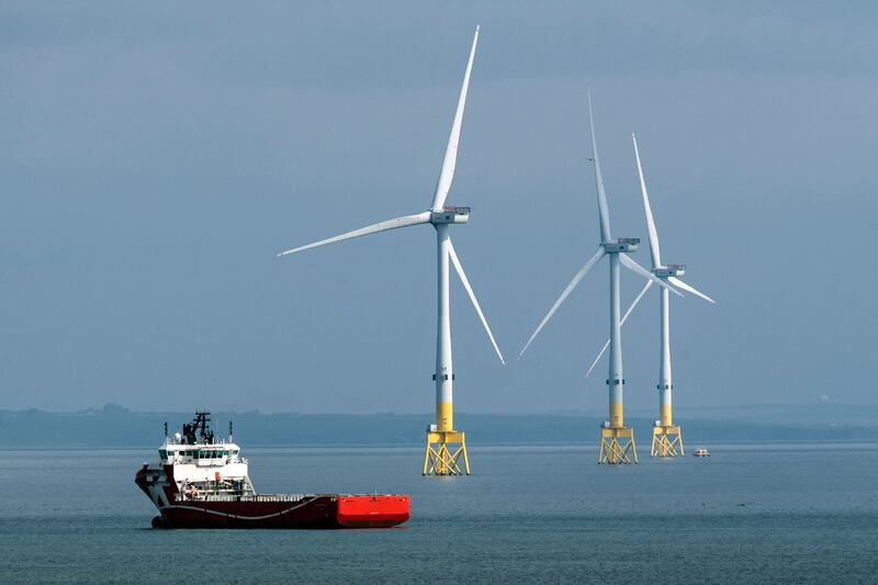 Britain plans to expand both wind power generation and oil and gas production offshore. AFP