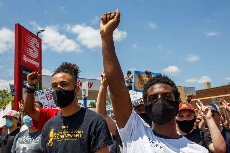 Protesters call for justice for George Floyd during his brother Terrence's visit, outside the Cup Foods on June 1, 2020 in Minneapolis, Minnesota.  AFP