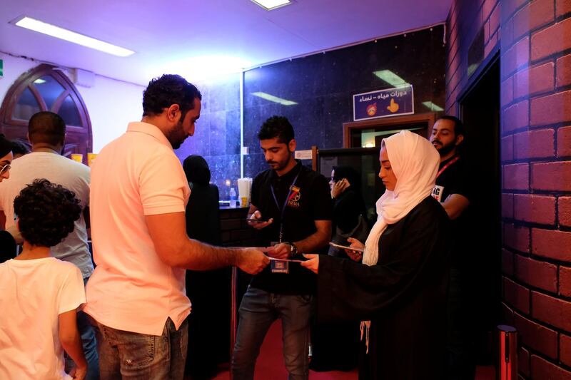 People arrive to first Saudi Arabia cinema in Jeddah, Saudi Arabia January 13, 2018. Picture taken January 13, 2018. REUTERS/Reem Baeshen NO RESALES. NO ARCHIVES