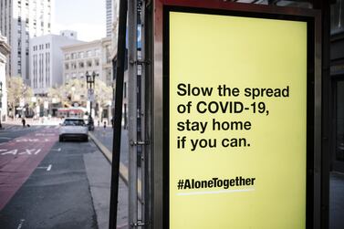 A bus stop sign displays an advertisement placed by the Centre for Disease Control in San Francisco, California. Michael Short / Bloomberg