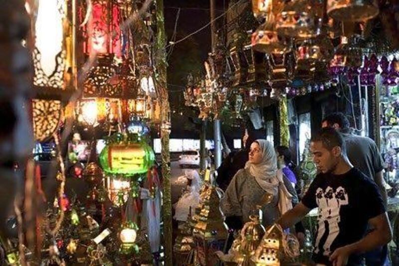 Colourful lanterns are sold in Egypt during the Holy Month of Ramadan. This year, however, lantern displays have burnt less bright after the Egyptian government urged the public to reduce its energy use. Scott Nelson for The National