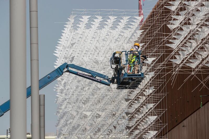 The Polish pavilion at the EXPO 2021 site nears completion. The pavilion has metal birds on the outside and inside that are partially installed along with a special wood panelled interior and exterior on May 2nd, 2021. 
Antonie Robertson / The National.
Reporter: Ramola Talwar for National