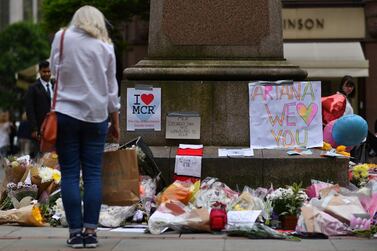 Floral tributes at Albert Square in Manchester, placed to commemorate the victims of the terrorist attack at the Manchester Arena on May 22, 2017. AFP