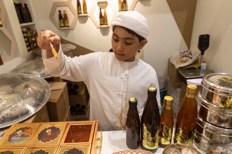 The five-day Hatta Honey Festival began on December 27 with the participation of 60 Emirati beekeepers. Here in the pic, Ziad Elhadek shows off the produce from AlHor Honey. All photos: Antonie Robertson / The National