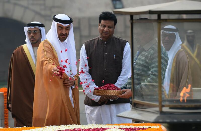 Sheikh Mohammed bin Zayed, Crown Prince of Abu Dhabi and Deputy Supreme Commander of the Armed Forces, pays a tribute at Raj Ghat, the memorial for Mahatma Gandhi in New Delhi on Wednesday. Prakash Singh / AFP