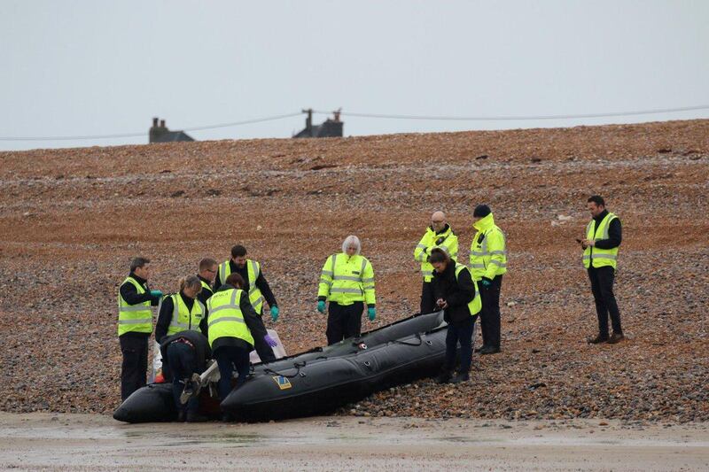 Britain's Border Force carry an intercepted migrant dinghy off the Kent coast, Britain December 31, 2018 in this picture obtained from social media. Twitter/Susan Pilcher via REUTERS  ATTENTION EDITORS - THIS IMAGE HAS BEEN SUPPLIED BY A THIRD PARTY. NO RESALES. NO ARCHIVES. MANDATORY CREDIT. TPX IMAGES OF THE DAY