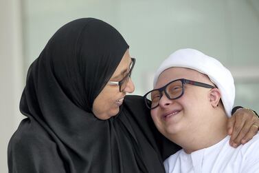 Dr Manal Jaroor, founder member and chairwoman of the Emirates Down Syndrome Association with her son Mahmoud Jaroor in Dubai. Satish Kumar for The National