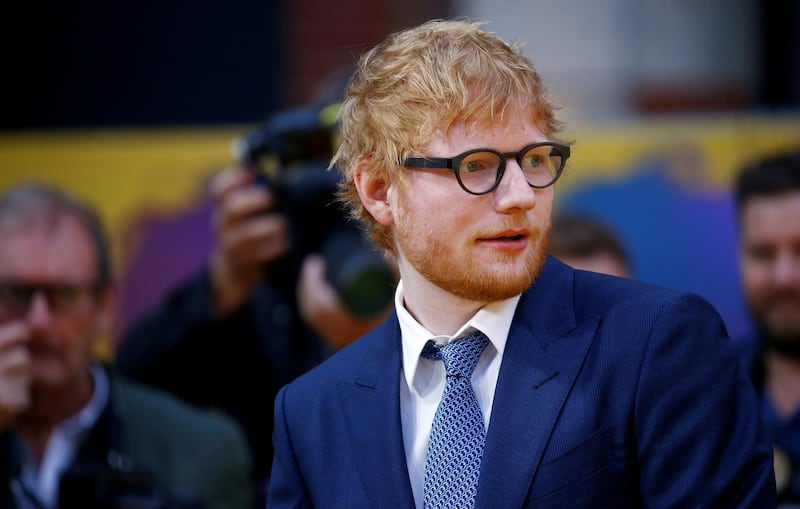 Singer Ed Sheeran is the new shirt sponsor for third-division club Ipswich. Reuters