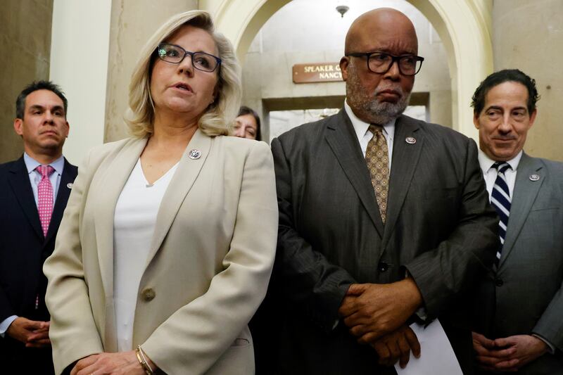 Liz Cheney, committee chairman Bennie Thompson and other members of the committee speak to reporters after meeting with Nancy Pelosi. Reuters