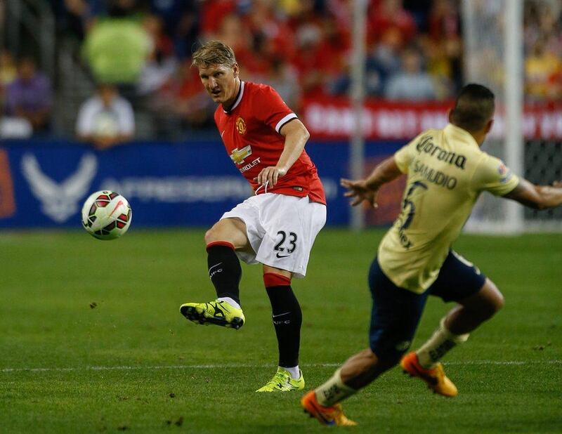 Manchester United's Bastian Schweinsteiger plays a pass against Club America in their pre-season friendly on Friday night. Otto Greule Jr / Bongarts / Getty Images