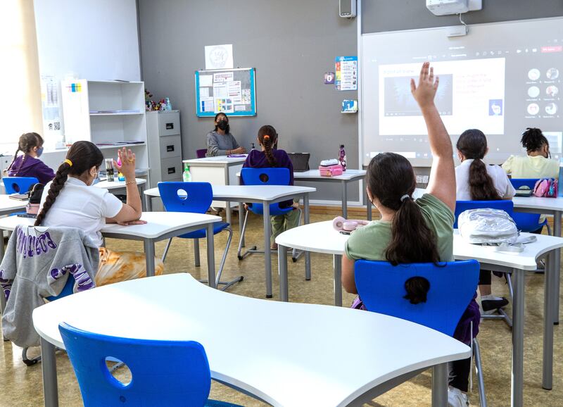 Pupils at American Academy for Girls in Dubai. Depending on the lesson, teachers might have most pupils attending in person or online.