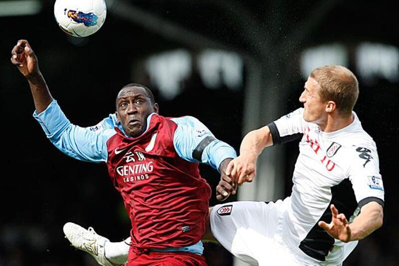 Emile Heskey, left, is challenged by Fulham defender Brede Hangeland during the two sides' 0-0 draw at Craven Cottage.

Akira Suemori / AP Photo