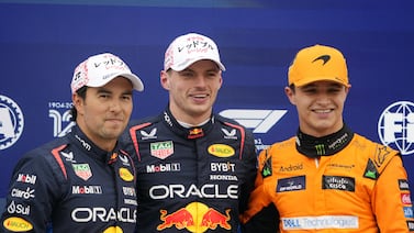 Red Bull's Max Verstappen, centre, will start on pole position with teammate Sergio Perez, left, second and McLaren's Lando Norris third. EPA