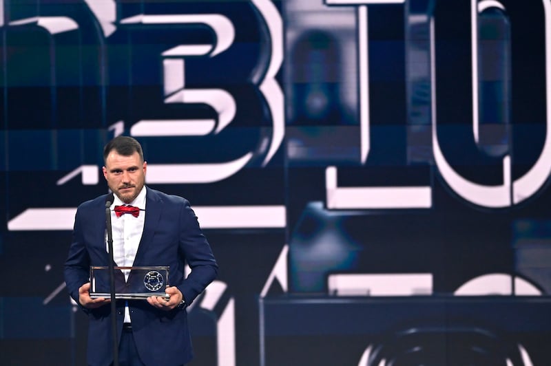Marcin Oleksy speaks to the audience after receiving the Fifa Puskas Award 2022. Getty Images