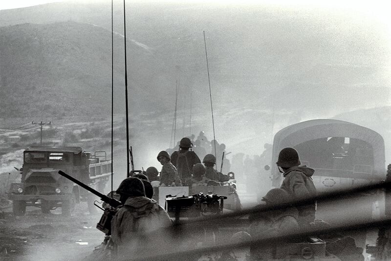 A handout file picture provided by the GPO and dated October 8, 1973 shows Israeli units moving into battle counter-attacking Syrian troops on the Golan Heights during the Yom Kippur war. / AFP PHOTO / GPO / DAVID RUBINGER