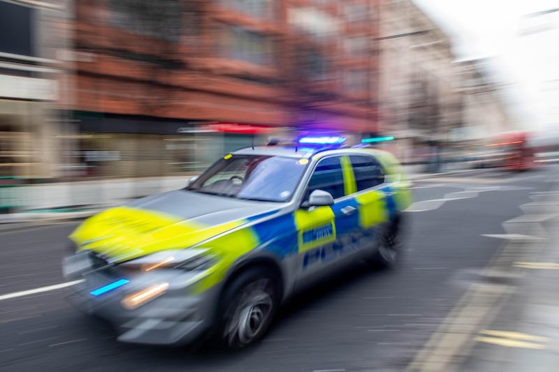 A police car speeds down Oxford Street in London, U.K., on Friday, Jan. 15, 2021. Londoners have received one tenth of all vaccine shots administered in England, despite facing a crisis thats pushing the capitals hospitals to the brink of collapse. Photographer: Chris J. Ratcliffe/Bloomberg