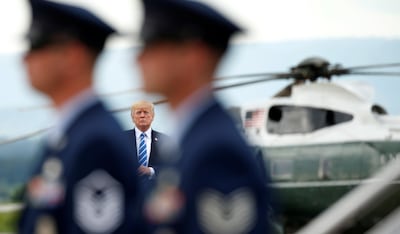 U.S. President Donald Trump walks from Marine One to board Air Force One as he departs Hagerstown, Maryland, U.S., after holding a meeting at nearby  Camp David with the National Security Council, August 18, 2017. REUTERS/Kevin Lamarque