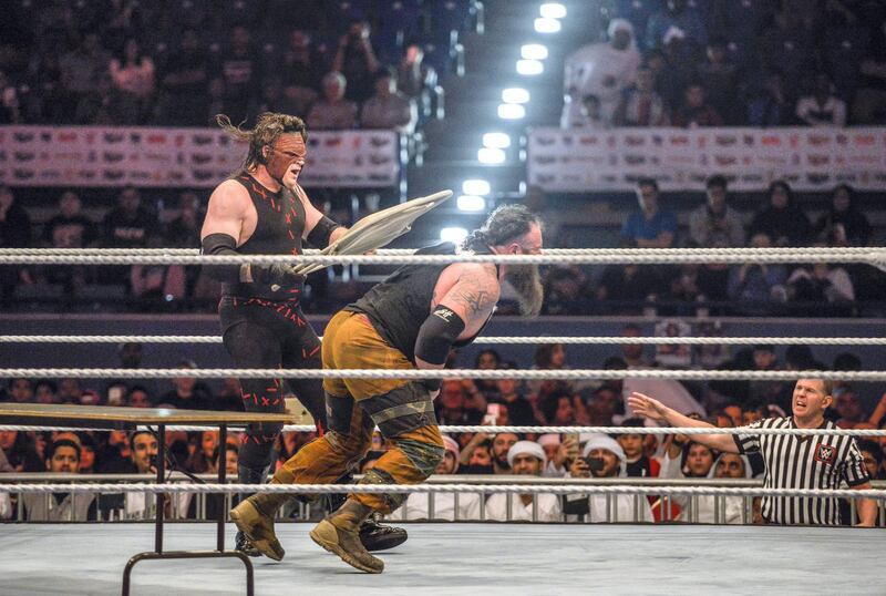 Abu Dhabi, United Arab Emirates - Kane vs Braun Strowman at the opening night of WWE, which takes place in Zayed Sports City Tennis Stadium on Thursday December 7, 2017. (Khushnum Bhandari/ The National)

