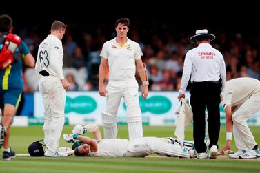 Australia's Steve Smith lays on the floor after being hit by a ball from England's Jofra Archer. Paul Childs / Reuters