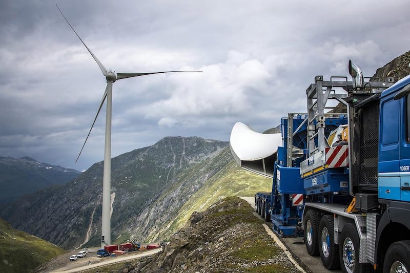 A wind turbine blade is transported to the Griessee lake site in,Valais, Switzerland. Each blade weighs about 11,000 kilograms. Olivier Maire / EPA