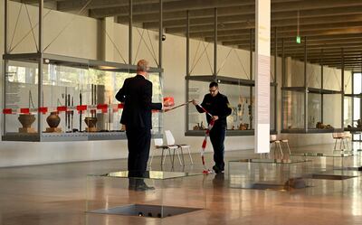 Police officers seal off an area in the Celtic and Roman Museum in Manching, southern Germany, where a hoard of valuable coins was stolen. AFP