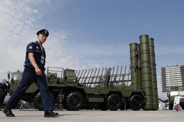A Russian military official walks past an S-400 anti-aircraft missile system. EPA
