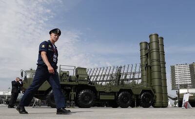 epa07647266 (FILE) - A Russian military official walks in front of The S-400 Triumph anti-aircraft missile system during the Army 2017 International Military Technical Forum in Patriot Park outside Moscow, Russia, 22 August 2017 (reissued 14 June 2019). The S-400 system can simultaneously hit 36 targets within a radius of 400 kilometres and up to an altitude of 27 kilometres - for many states this means a significant expansion of their defence capabilities. In recent years, many countries have bought  or intend to buy the Russian S-400 air defence system, including China, Saudi Arabia, India and Qatar. The most prominent and sensitive case for NATO is Turkey. Turkey intends to purchase the advanced Russian S-400 air defence system, the first missiles and their associated radars could start to be delivered in July 2019.  EPA/YURI KOCHETKOV *** Local Caption *** 53719076