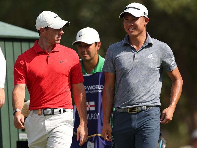 Collin Morikawa, right, with Rory McIlroy during day three of the DP World Tour Championship at Jumeirah Golf Estates on Saturday, November 20, 2021. EPA
