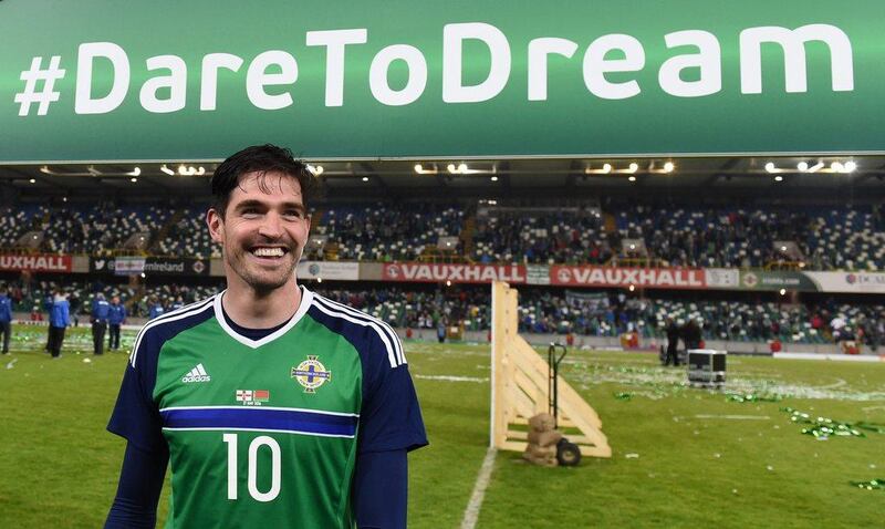 Northern Ireland striker Kyle Lafferty poses for photos at Windosr Park before leaving for France to participate in Euro 2016. Clodagh Kilycoyne / Reuters