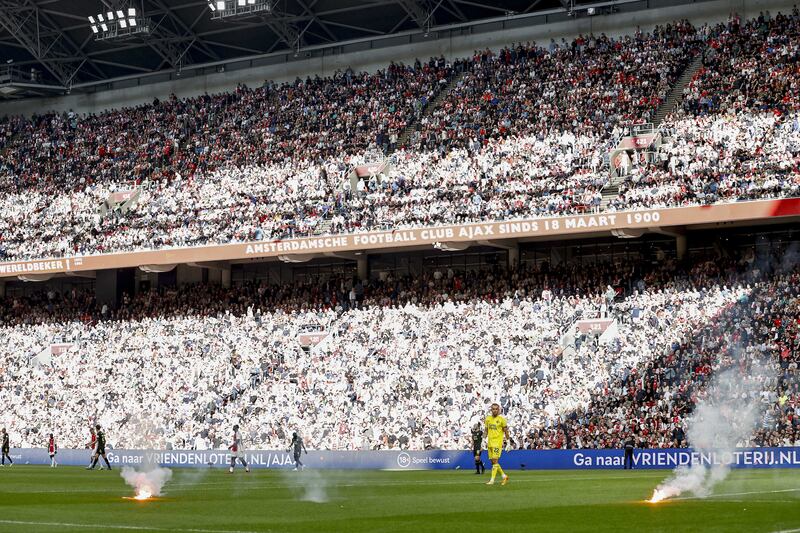Fireworks on the pitch during the Dutch Eredivisie soccer match between Ajax and Feyenoord. EPA