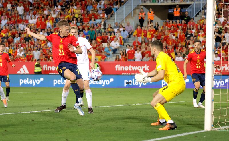 Dani Olmo passes for Pablo Sarabia to score Spain's second goal against Czech Republic. Reuters