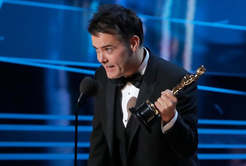Sebastian Lelio accepts the Oscar for Best Foreign Language Film for A Fantastic Woman. Lucas Jackson / Reuters