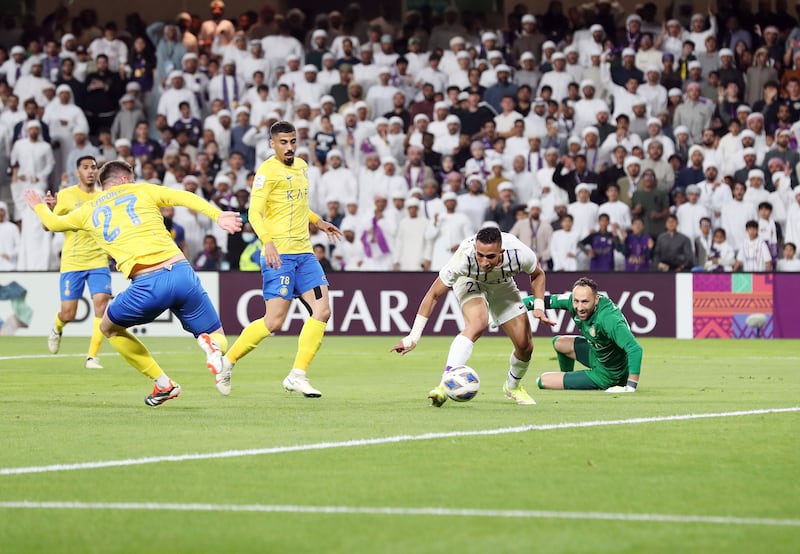 Al Ain's Soufiane Rahimi scores the winning goal. 