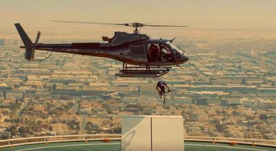 Despite his fear of heights, BMX star Kriss Kyle drops out of a helipcopter on to the Burj Al Arab helipad. YouTube