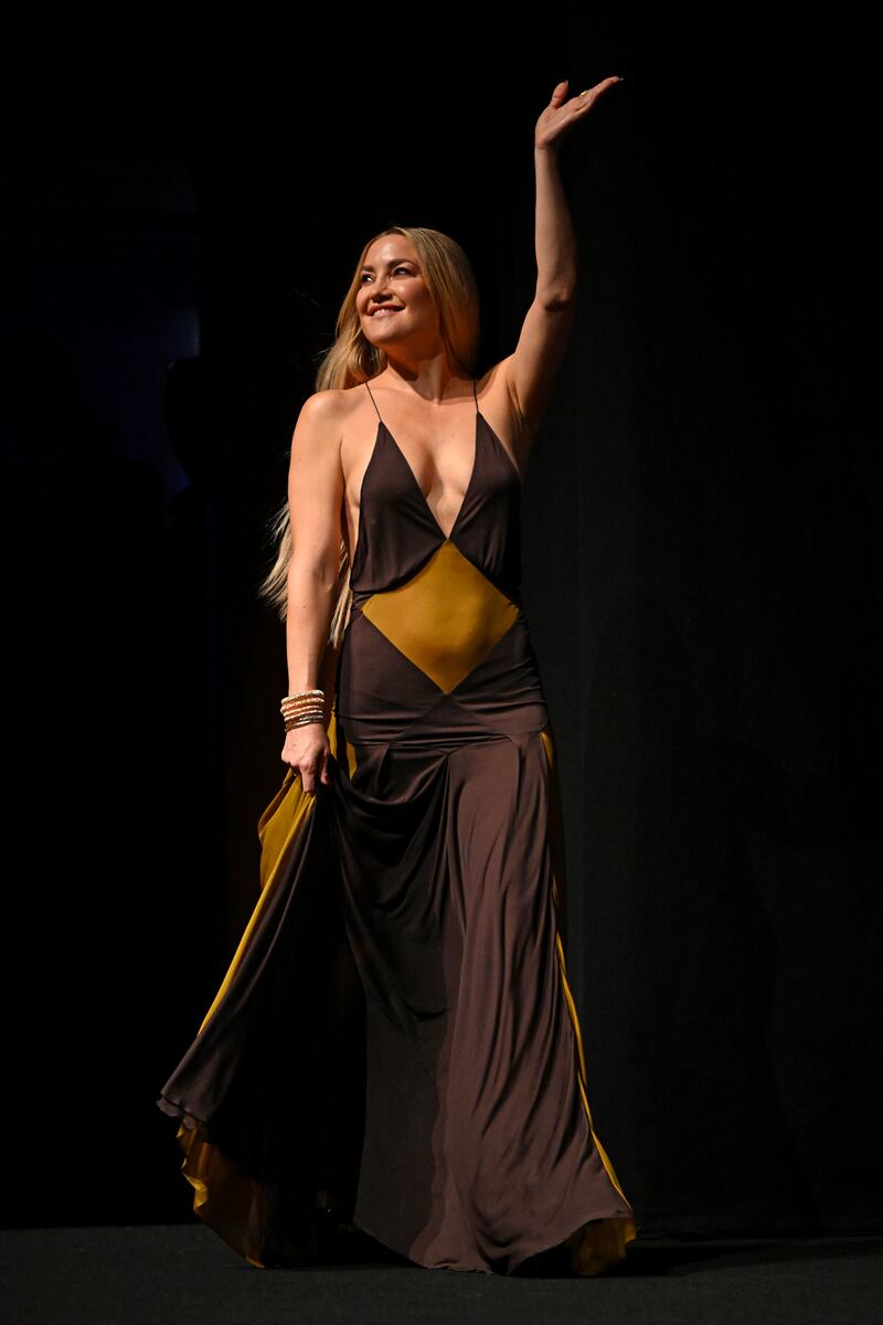 Kate Hudson walks on stage. Getty Images 
