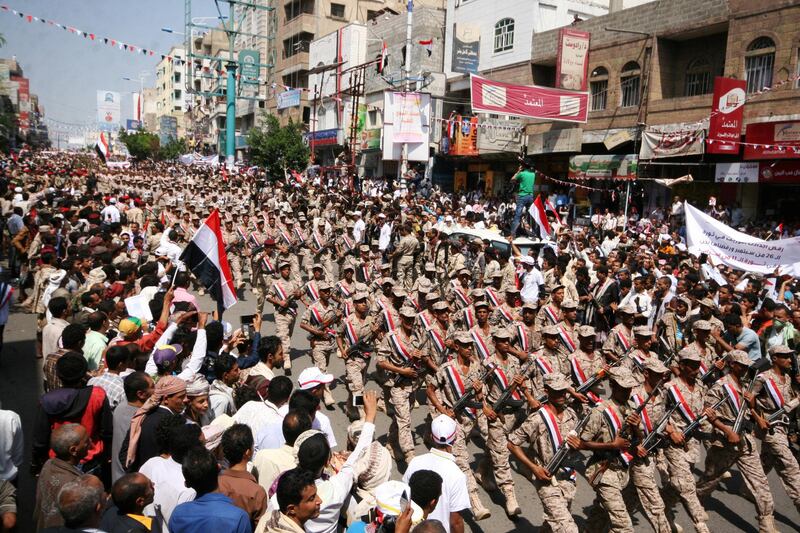 Pro-government troops parade to mark the 55th anniversary of the September 1962 revolution in the war-torn southwestern city of Taiz, Yemen September 26, 2017. REUTERS/Anees Mahyoub
