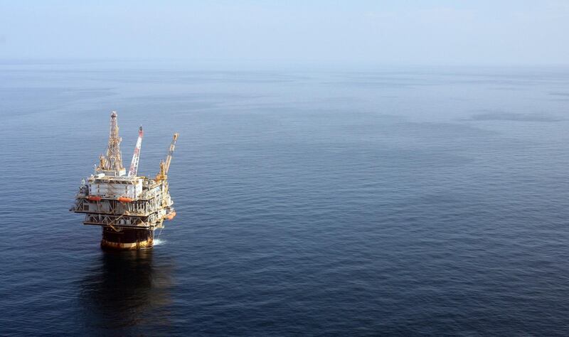 FILE - In this file photo taken Aug. 19, 2008, the Chevron Genesis Oil Rig Platform is seen in the Gulf of Mexico near New Orleans, La.  Chevron will buy Anadarko Petroleum for $33 billion in a cash-and-stock deal as the company seeks to grow stronger in deep water exploration in the gulf and the energy-rich southwest region of Texas called the Permian Basin. The deal, announced Friday, April 12, 2019 arrives with U.S. crude prices up 40% this year.  (AP Photo/Mary Altaffer, file)