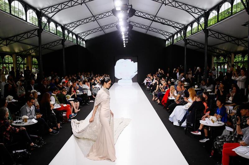 Dubai-based designer Michael Cinco made his debut at Paris Haute Couture Week in July. Richard Bord / Getty Images