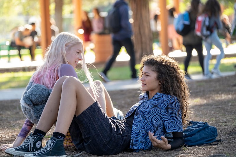 This image released by HBO shows Zendaya, right, and Hunter Schafer in a scene from "Euphoria," airing Sundays at 10 p.m. ET on HBO. (Eddy Chen/HBO via AP)