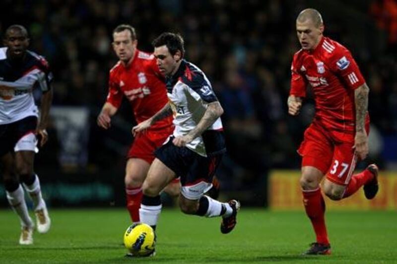 Bolton Wanderers’s Mark Davies opened the scoring as his side beat Liverpool 3-1.